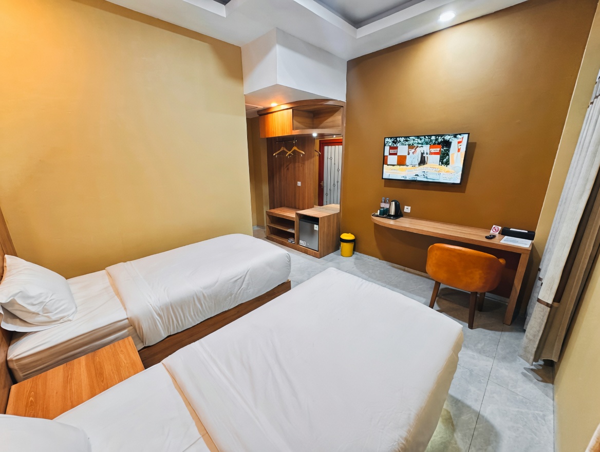 Kamar Deluxe Nusantara Inn — kamar luas 32m² untuk long stay kontraktor dan ASN di dekat IKN dengan WiFi super cepat dan laundry harian